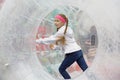 Children`s entertainment in the amusement park-running inside the zorb