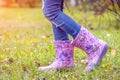 Children`s feet in rubber boots Royalty Free Stock Photo