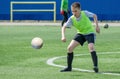 Children\'s football. An interesting football moment at the match and training, the boys are recklessly fighting for the ball