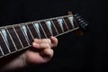 Children`s hand close up learning guitar playing . Royalty Free Stock Photo