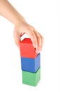 Children's hand and toy cubes Royalty Free Stock Photo