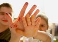 Children`s hands boy and girl in paints. Brother and sister draw at home Royalty Free Stock Photo