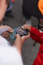 Children using compass, orienteering activity, hands detail, maps, nature Royalty Free Stock Photo