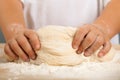 Children`s hands and the hands of his mother and knead dough tog Royalty Free Stock Photo