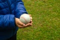 Children`s hands hold a baseball ball Royalty Free Stock Photo