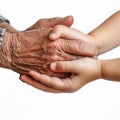 Children\'s hands hold the hand of an old man close-up on a white background, the concept of the continuity of generations, Royalty Free Stock Photo