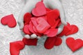 In children`s hands a lot of decorative hearts. Valentines day gift.