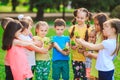 Children`s hands planting young tree on black soil together as the world`s concept of rescue. Royalty Free Stock Photo