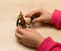 Children`s hands play with plasticine