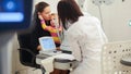 Children`s healthcare - optometrist in clinic checking little child`s vision Royalty Free Stock Photo