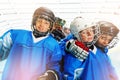 Children`s ice hockey team celebrating victory Royalty Free Stock Photo