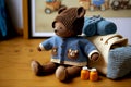 children's jacket clothes and hat on table cute kits knitted toys