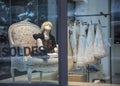 Children`s mannequin in a window of a children`s clothing store