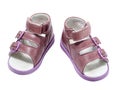 Children`s orthopedic shoes. purple leather sandals isolated on a white background