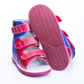 Children`s orthopedic shoes on a white background