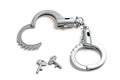 Children\'s plastic police handcuffs and keys on white background