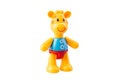 Children`s plastic toy - yellow giraffe on a white background isoated for kids