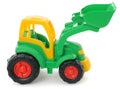 Children`s plastic toy, yellow-green bulldozer isolated on white