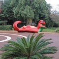 Children`s playground in the city of Holon in Israel: Sculptural abstract image of a fantastic animal like a dinosaur made from