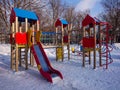 Children`s Playground in the city Park. Sunny winter`s day Royalty Free Stock Photo