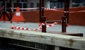 Children`s playground closed and wrapped in alarm caution tape for global coronavirus quarantine.No children on playgrounds. Royalty Free Stock Photo