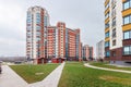 Children\'s playground in the courtyard of a multi-storey residential building against the background of a blue sky Royalty Free Stock Photo