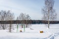 Children`s Playground, covered with snow. Royalty Free Stock Photo