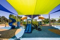 Children`s Playground Equipment Covered By Colorful Canopies