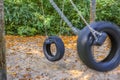 Children`s playground in Germany - view to two tire swings