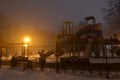 Children`s Playground On Misty Winter Night