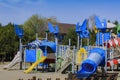 Children`s playground in the park for recreation and entertainment. Royalty Free Stock Photo
