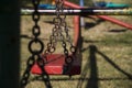 Children`s playground swing perspective shot Royalty Free Stock Photo