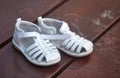 Children`s sandals on the boardwalk Royalty Free Stock Photo