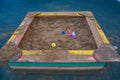 Children`s sandbox with toys on the playground. Copy space Royalty Free Stock Photo