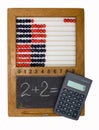 Children's school board, abacus and calculator Royalty Free Stock Photo