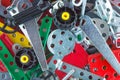 Children`s set of metal designer for modeling, nuts, bolts, tools, close. as background Royalty Free Stock Photo