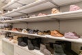 Children's shoe store. Shelf in the store with baby winter boots. Royalty Free Stock Photo