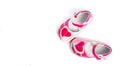 Children`s shoes with a red heart. Isolated on white background. Top view. Flat lay. Copy space Royalty Free Stock Photo