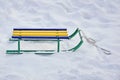 Children`s sled in the snow in winter. sledding Royalty Free Stock Photo