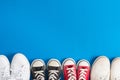 Children's sneakers.Blue background. Royalty Free Stock Photo