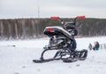 A children's snowmobile is ready for children to ride in the snow Royalty Free Stock Photo