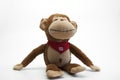 Children`s soft toy monkey brown. On white background