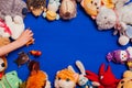 Children`s soft toys for developing games on a blue background Royalty Free Stock Photo