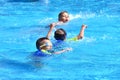 Three boys swim in the pool. autdoor Royalty Free Stock Photo