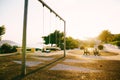 Children`s swings on the chain in the park