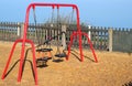 Children's swings in a playground.