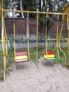 Children`s swings on a small Playground in Moscow