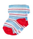 Children`s  tiny striped socks, white, blue and red in the pattern. Royalty Free Stock Photo