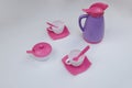 children& x27;s toy dishes for tea on a white background