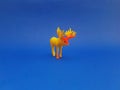 Children\'s toy in the form of a yellow moose character